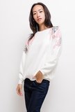 Trendy witte trui met motief in sequins._