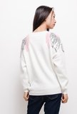 Trendy witte trui met motief in sequins._