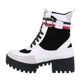 Hoge wit/zwarte veterboot Gael met sierband._