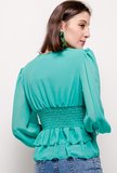 Trendy korte groene blouse._