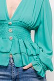 Trendy korte groene blouse._