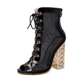 Zoe zwarte boot/sandaal met open toe._