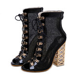 Zoe zwarte boot/sandaal met open toe._