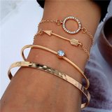 Gouden 4 delige armbanden set._