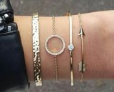 Gouden 4 delige armbanden set._