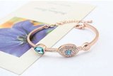 Bracelet rose, motif bleu_