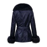 Stylishe donker blauwe winterjas in leather look._