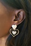 Boucles d'oreilles noir/or coeur à coeur._