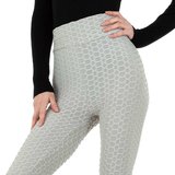 Sportieve grijze legging met struktuur._