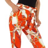 Oranje-witte chino legging met motief._