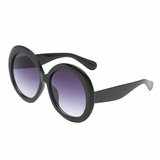 Grote zwart-blauwe robuste vintage zonnebril._
