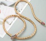 Gouden-multicolour halsketting in slangenvorm design._