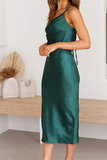 Groene satijnen one shoulder maxi jurk._