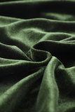 Trendy korte groene velvet jurk._