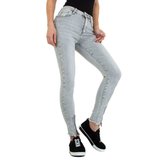 Licht grijze skinny jeans met enkelritsen._