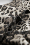 Trendy korte jurk met dierenprint._