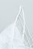 Elegante witte bodysuit in kant._