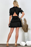 Zwarte korte jurk met ruffles. SOLD OUT_