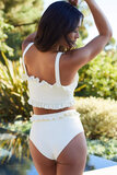 Witte bikini met ruffles._