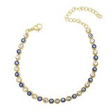 Goldplated armband met blauwe beads en zirconia steentjes._
