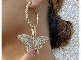 Grote gouden oorbellen met vlindermotief.SOLD OUT_
