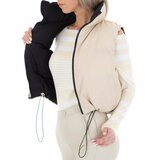 Korte omkeerbare beige bodywarmer._