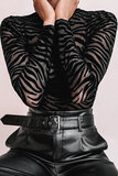 Zwarte bodysuit met zebraprint._
