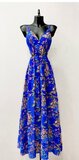 Royal blauwe chique armloze maxi jurk met print._