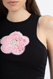 T-shirt sans manches en coton noir avec fleur rose en 3 D_