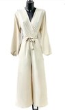 Modieuze beige jumpsuit met lange mouwen_