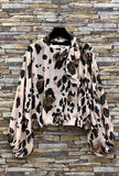 Trendy korte blouse met strik in cowprint_