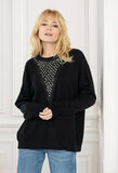 Pull noir surdimensionné avec col rond et strass_