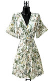 Mooie korte crossover beige groene jurk met bloemen print  _