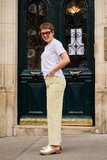 Trendy licht gele broek met wijde pijpen_