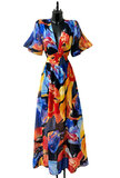 Mooie blauw-oranje maxi jurk met print_