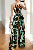Fashion groen-oranje-zwarte jumpsuit met print_