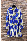 Mooie korte blauw-witte jurk met bloemen print_