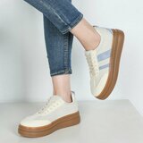 Sneakers plateforme jaunes Clauvie avec détails bleus_