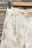 Luchtige wide leg broek beige met bloemenborduursel_