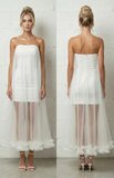 Elegante witte bustier jurk met tulle_
