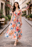 Elegante maxi jurk met kleurrijke bloemenprint en strikceintuur_