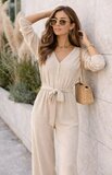 Beige elegante jumpsuit met strikceintuur_
