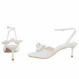 Witte hak sandalen Charmy met strikdetail_
