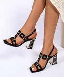 Zwarte suédine sandalen Charetti met metallic hak_