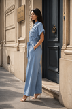 Lichtblauwe fluid denim jumpsuit met ceintuur_