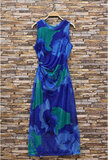 Magnifique robe bodycon sans manches bleu-vert_