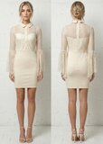 Luxe kanten mini jurk in crème met transparante mouwen – elegante avondlook_