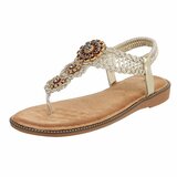 Gouden teensandalen met sierlijke boho-details-Annalize_