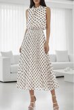 Crèmekleurige midi jurk met bruine stippenprint en plissérok_