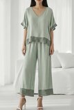 Kakigroene viscose set met gehaakte details_